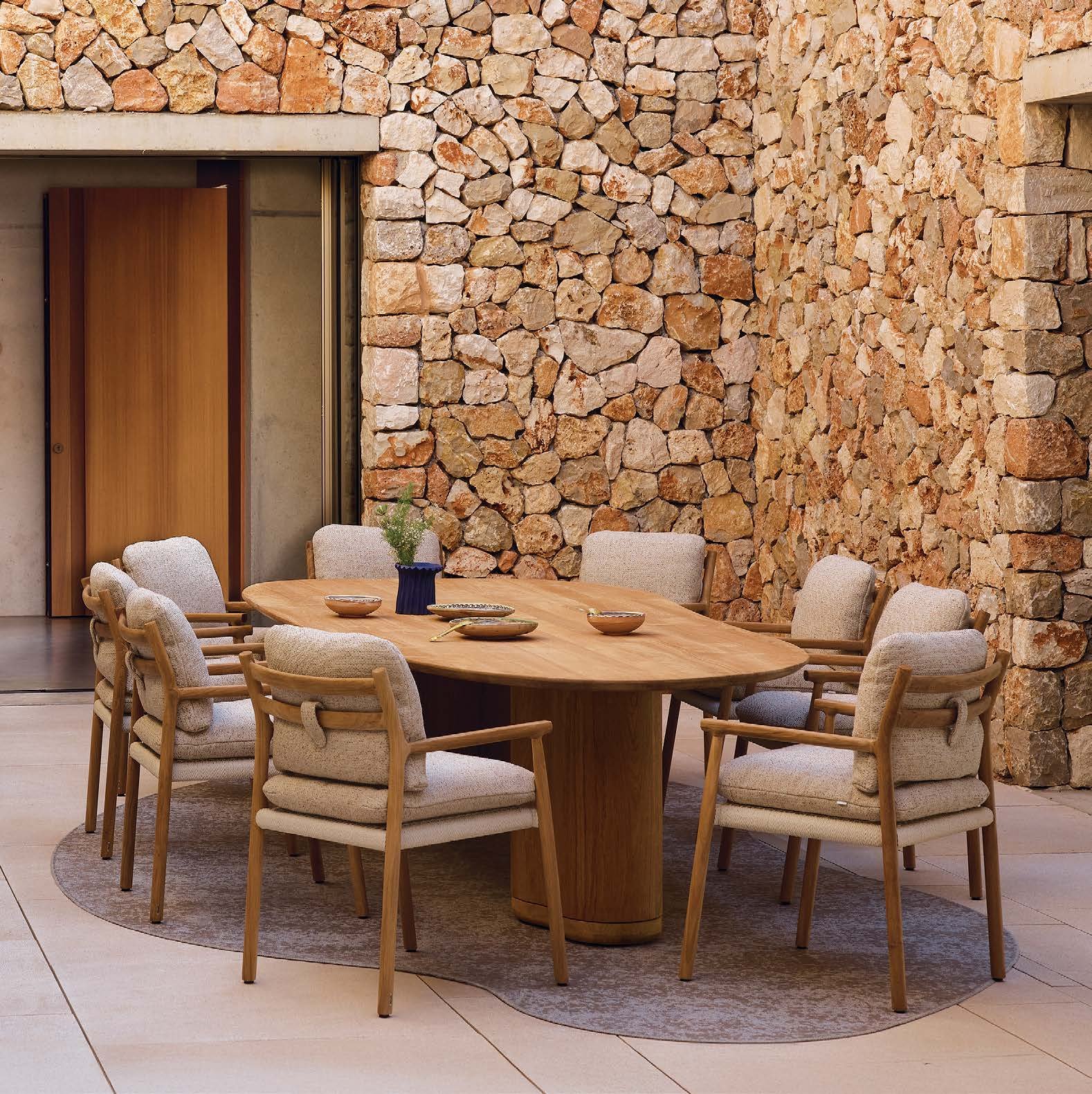 Muyu dining chairs around an Ogado round table.