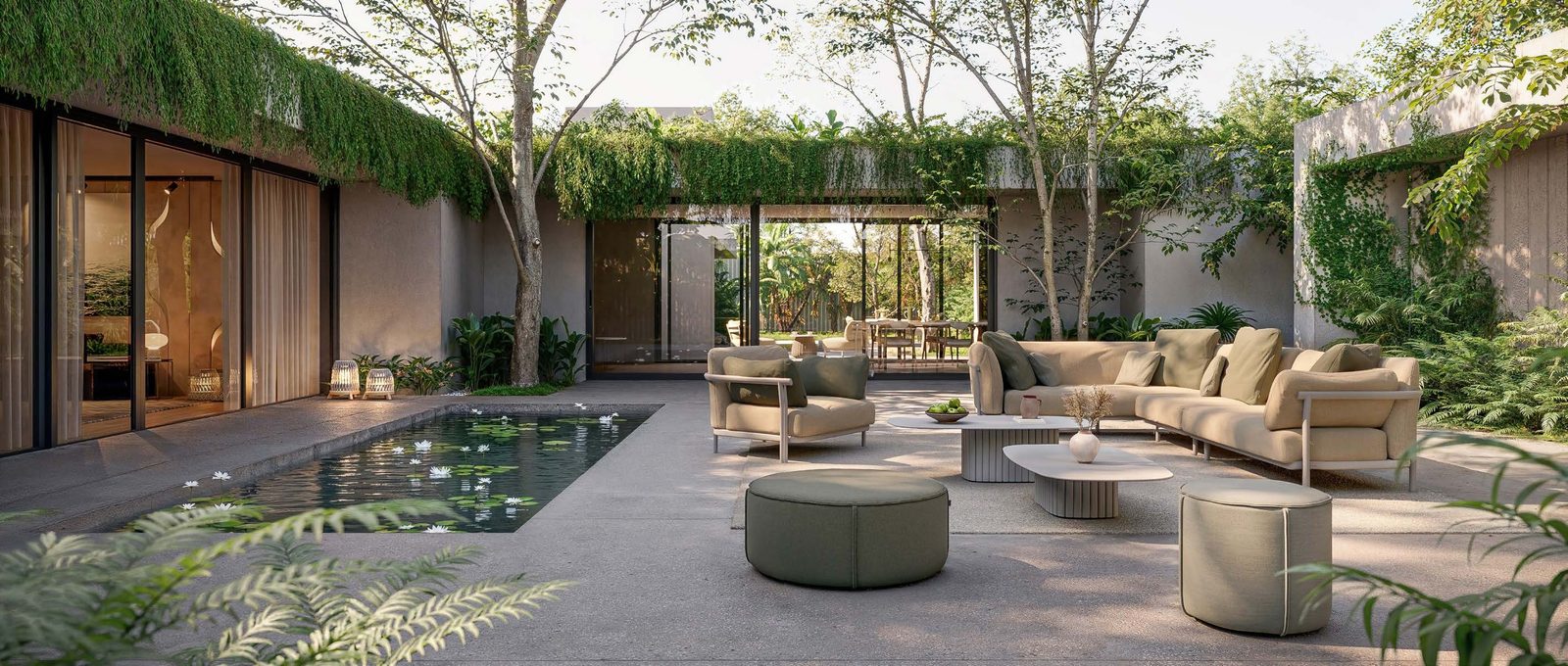 Sandua lanterns among Nami sofas in a planted courtyard.